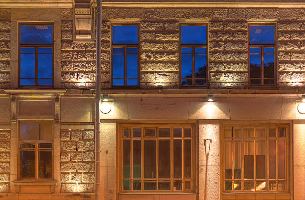 Indian villa façade with motion-sensor LED floodlighting at night