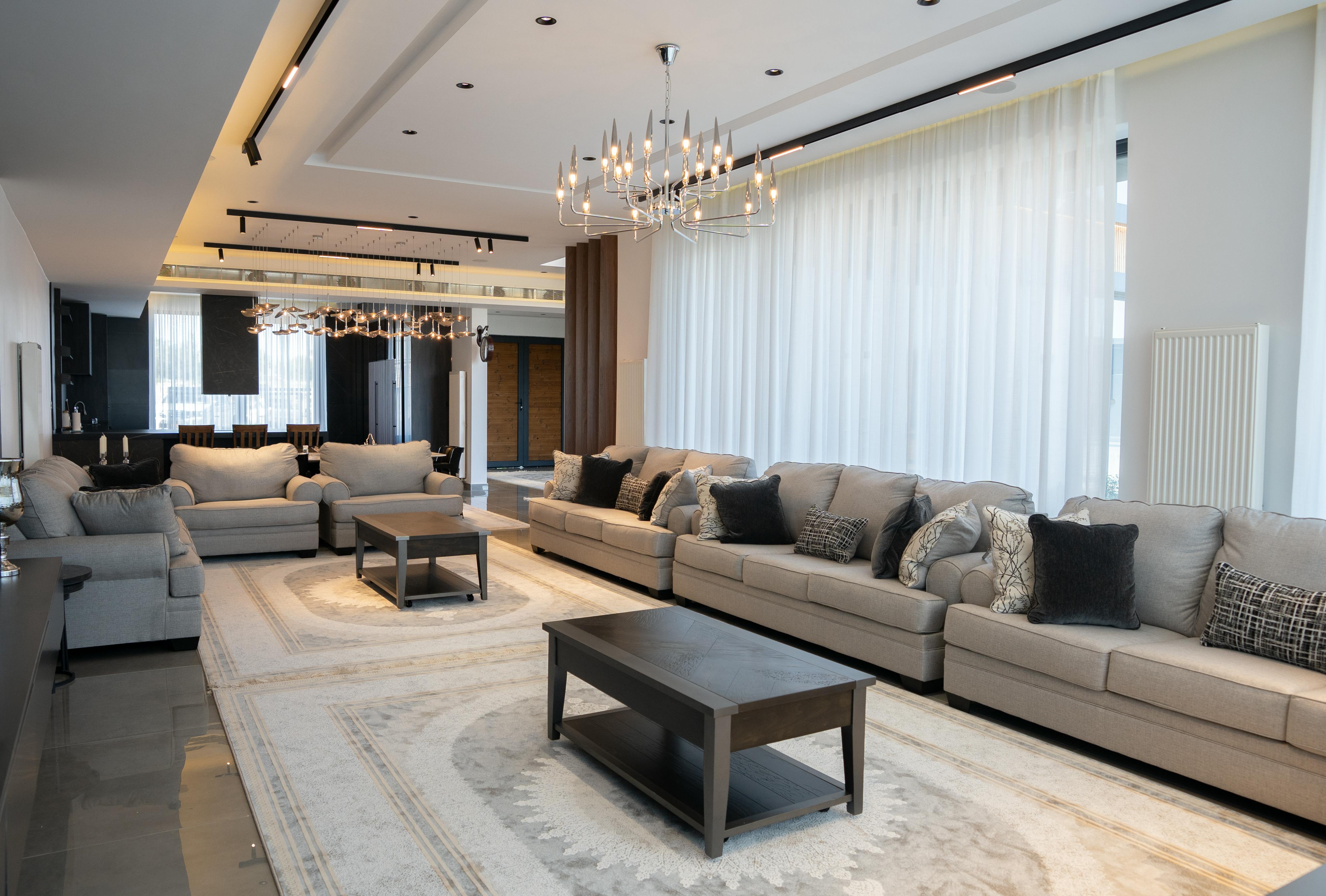 Interior Lighting Design for Luxury Homes in India – hero image with chandelier and cove lighting