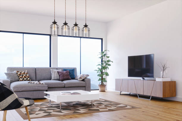 Living room with decorative pendant cluster lights above coffee table