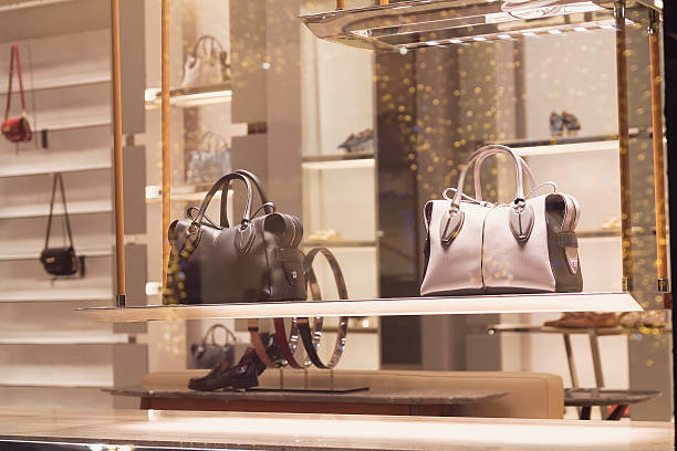 Spotlights highlighting premium handbags in boutique store