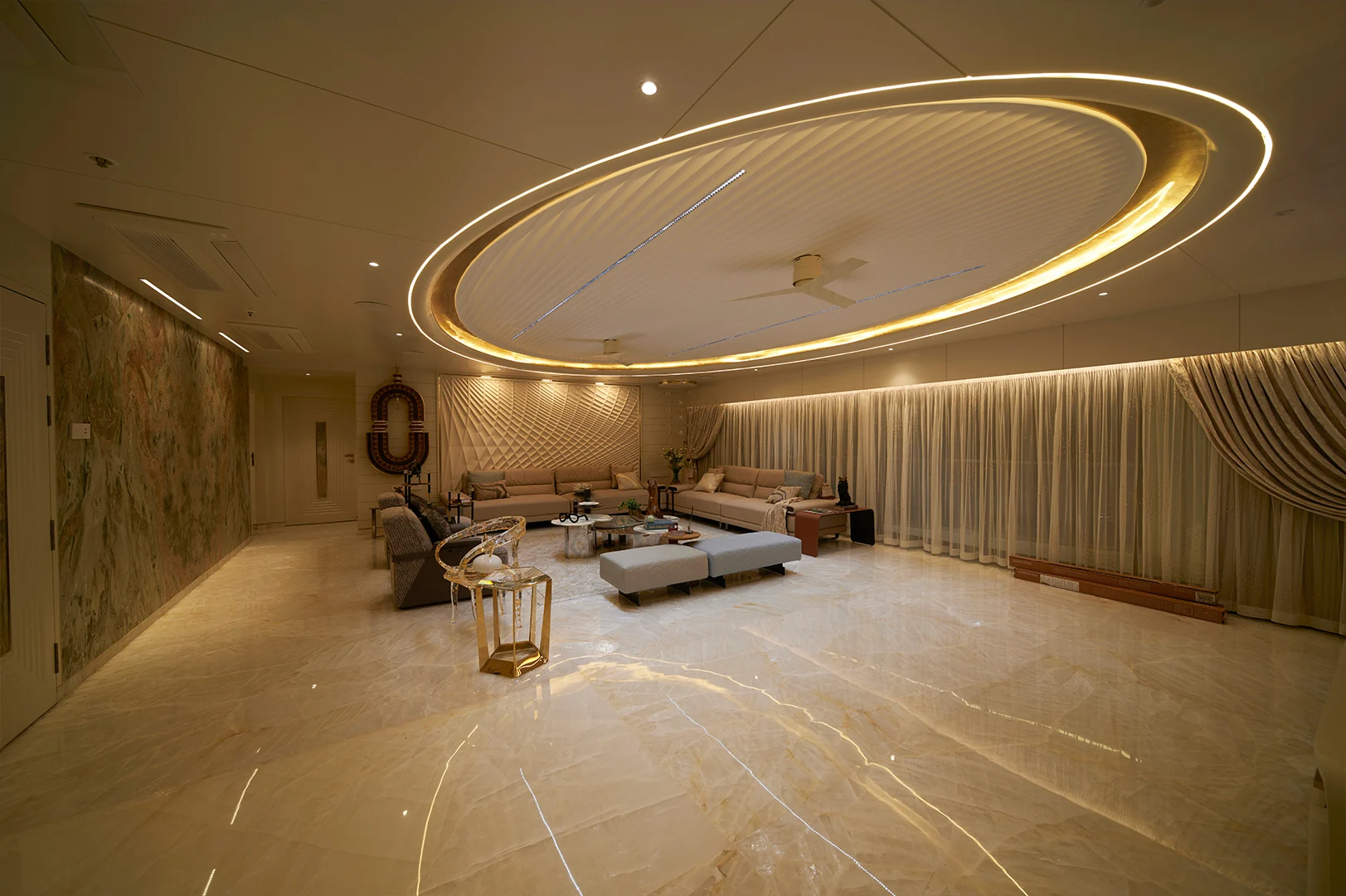 Stylish hospitality interior lighting design with cove lights and elegant lounge setup