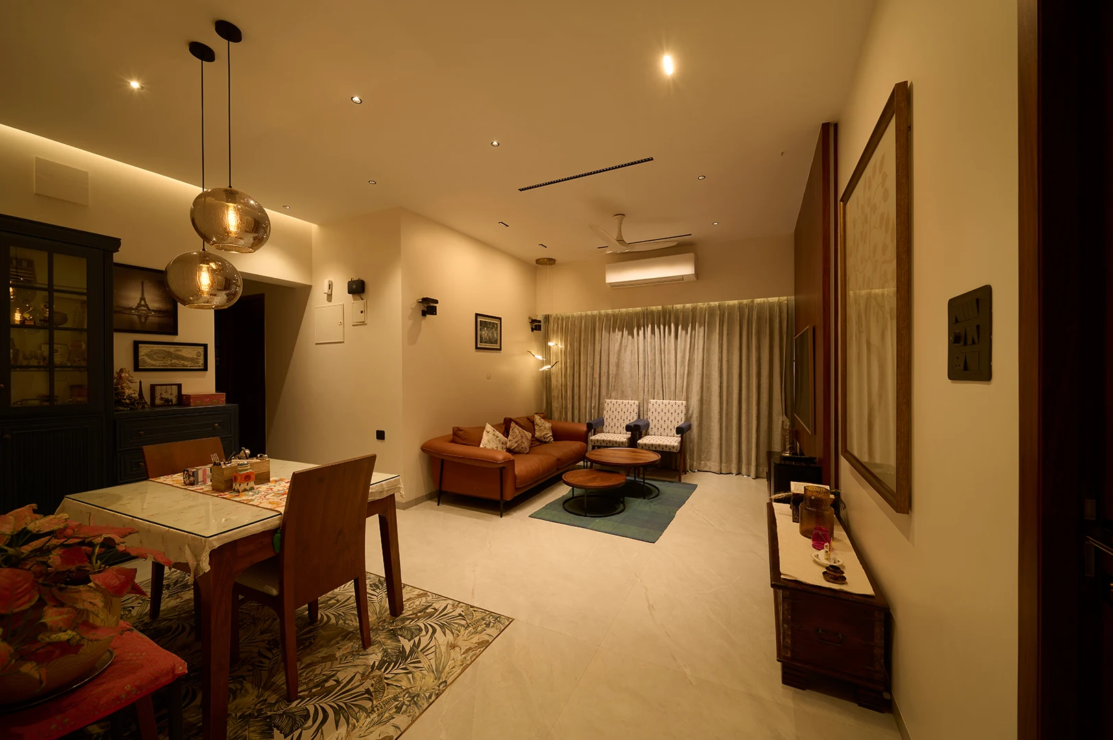Ambient residential lighting design in a modern living room with cove ceiling lights